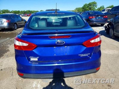 Zdjęcie 6 z 13 samochodu: 2014 FORD FOCUS TITANIUM VIN:1FADP3J26EL240888 - miniatura