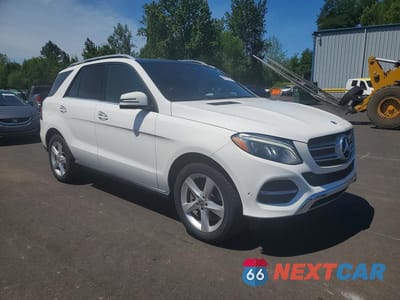 Czwarte zdjęcie samochodu z boku: 2017 MERCEDES-BENZ GLE 350 4MATIC VIN:4JGDA5HB5HA991201 - miniatura