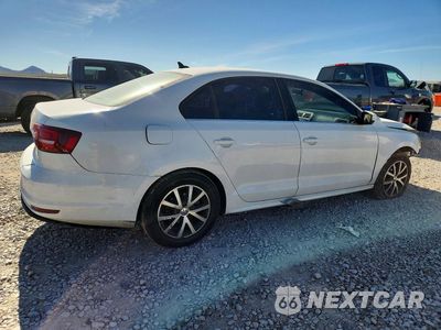 Trzecie zdjęcie samochodu z tyłu: 2017 VOLKSWAGEN JETTA SE VIN:3VWDB7AJ2HM314685 - miniatura