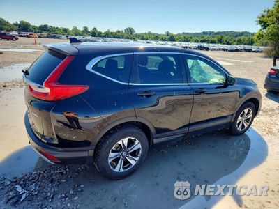 Trzecie zdjęcie samochodu z tyłu: 2018 HONDA CR-V LX VIN:2HKRW6H35JH210329 - miniatura