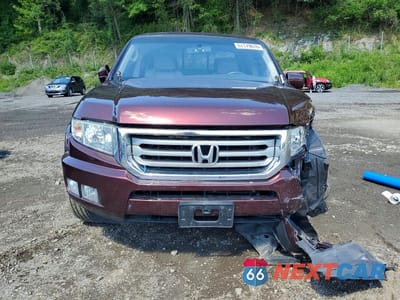 Piąte zdjęcie samochodu w środku: 2012 HONDA RIDGELINE RTL VIN:5FPYK1F51CB457239 - miniatura
