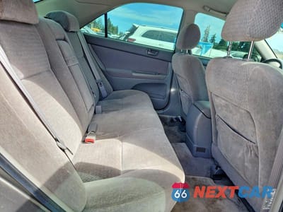 Zdjęcie 10 z 12 samochodu: 2004 TOYOTA CAMRY LE VIN:JTDBE32K340297653 - miniatura