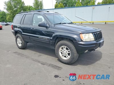 Czwarte zdjęcie samochodu z boku: 2000 JEEP GRAND CHEROKEE LIMITED VIN:1J4GW58N3YC286411 - miniatura