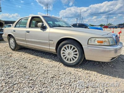 Czwarte zdjęcie samochodu z boku: 2010 MERCURY GRAND MARQUIS LS VIN:2MEBM7FV2AX634632 - miniatura