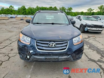 Piąte zdjęcie samochodu w środku: 2010 HYUNDAI SANTA FE GLS VIN:5NMSGDAB6AH412887 - miniatura