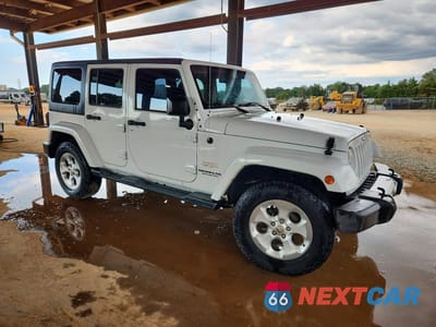 Czwarte zdjęcie samochodu z boku: 2015 JEEP WRANGLER UNLIMITED SAHARA VIN:1C4BJWEG8FL573444 - miniatura