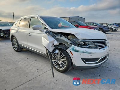 Czwarte zdjęcie samochodu z boku: 2017 LINCOLN MKX RESERVE VIN:2LMPJ6LR5HBL41459 - miniatura