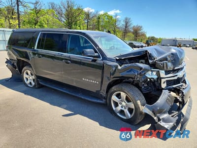 Czwarte zdjęcie samochodu z boku: 2017 CHEVROLET SUBURBAN K1500 LT VIN:1GNSKHKC9HR343820 - miniatura