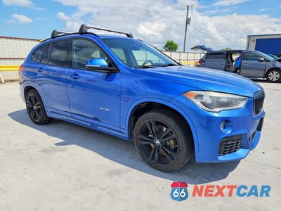 Czwarte zdjęcie samochodu z boku: 2017 BMW X1 XDRIVE28I VIN:WBXHT3C37H5F80031 - miniatura