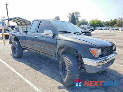 Czwarte zdjęcie samochodu z boku: 1997 TOYOTA TACOMA XTRACAB SR5 VIN:4TAWN74N6VZ313272 - miniatura