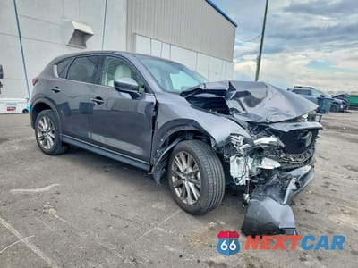 Czwarte zdjęcie samochodu z boku: 2021 MAZDA CX-5 GRAND TOURING VIN:JM3KFBDM3M1499528 - miniatura