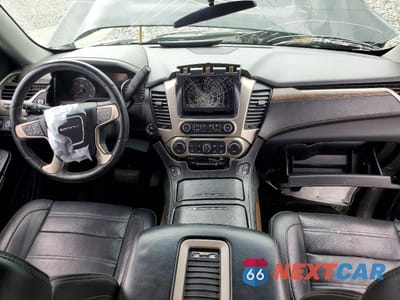 Zdjęcie 8 z 14 samochodu: 2018 GMC YUKON DENALI VIN:1GKS1CKJ3JR170285 - miniatura