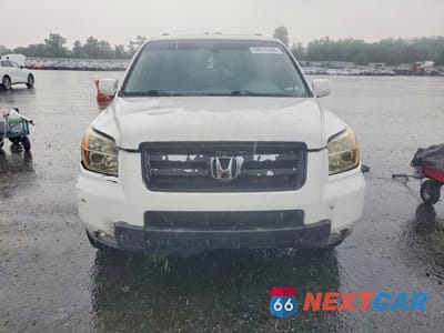 Piąte zdjęcie samochodu w środku: 2006 HONDA PILOT EX VIN:2HKYF18546H538168 - miniatura