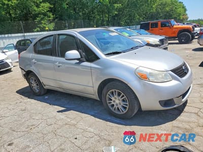 Czwarte zdjęcie samochodu z boku: 2012 SUZUKI SX4 LE VIN:JS2YC5A34C6301409 - miniatura