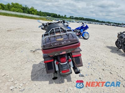 Czwarte zdjęcie samochodu z boku: 2013 HARLEY-DAVIDSON FLHTK ELECTRA GLIDE ULTRA LIMITED VIN:1HD1KEM1XDB607675 - miniatura