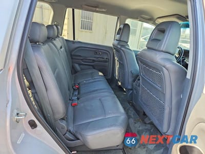 Zdjęcie 11 z 13 samochodu: 2003 HONDA PILOT EXL VIN:2HKYF18583H595100 - miniatura