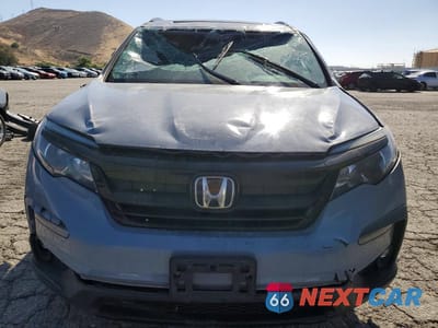 Piąte zdjęcie samochodu w środku: 2022 HONDA PILOT SE VIN:5FNYF5H25NB022718 - miniatura
