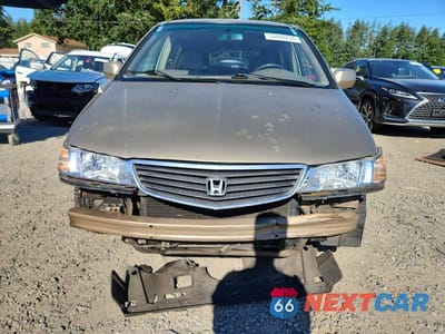 Piąte zdjęcie samochodu w środku: 2000 HONDA ODYSSEY EX VIN:2HKRL1866YH601361 - miniatura