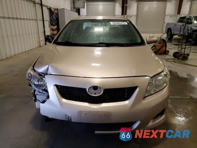 Piąte zdjęcie samochodu w środku: 2009 TOYOTA COROLLA LE VIN:1NXBU40E79Z105085 - miniatura