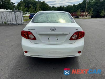 Piąte zdjęcie samochodu w środku: 2010 TOYOTA COROLLA LE VIN:JTDBU4EE0AJ075043 - miniatura