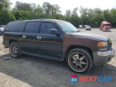 Czwarte zdjęcie samochodu z boku: 2002 GMC YUKON XL K1500 VIN:3GKFK16Z42G272635 - miniatura