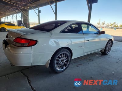 Trzecie zdjęcie samochodu z tyłu: 2000 TOYOTA CAMRY SOLARA SE V6 VIN:2T1CF22P4YC310171 - miniatura