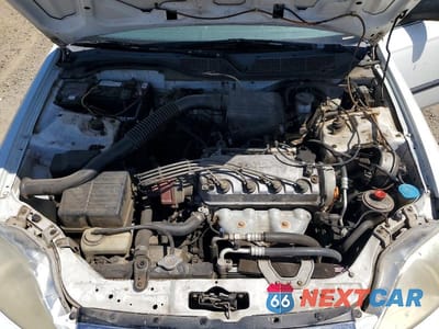 Zdjęcie 11 z 12 samochodu: 1999 HONDA CIVIC LX VIN:1HGEJ6675XL054267 - miniatura