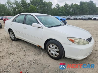 Czwarte zdjęcie samochodu z boku: 2002 TOYOTA CAMRY LE VIN:JTDBE32K320007733 - miniatura