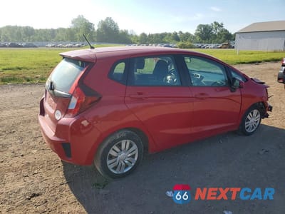 Trzecie zdjęcie samochodu z tyłu: 2017 HONDA FIT LX VIN:3HGGK5H58HM712224 - miniatura