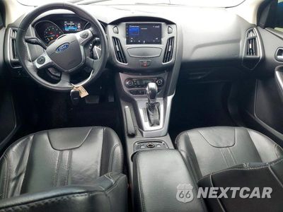 Zdjęcie 8 z 12 samochodu: 2014 FORD FOCUS TITANIUM VIN:1FADP3J26EL349528 - miniatura