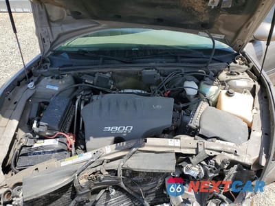 Zdjęcie 11 z 12 samochodu: 2000 BUICK PARK AVENUE VIN:1G4CW54K7Y4227772 - miniatura