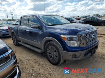 Czwarte zdjęcie samochodu z boku: 2018 NISSAN TITAN PLATINUM RESERVE VIN:1N6AA1E69JN511518 - miniatura