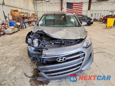 Piąte zdjęcie samochodu w środku: 2017 HYUNDAI ELANTRA GT BASE VIN:KMHD35LH3HU376845 - miniatura