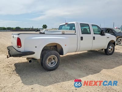Trzecie zdjęcie samochodu z tyłu: 1999 FORD F350 SUPER DUTY VIN:1FTWW33F0XEC15031 - miniatura