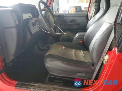 Zdjęcie 7 z 12 samochodu: 2000 JEEP WRANGLER / TJ SE VIN:1J4FA29P6YP735131 - miniatura