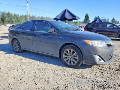 Czwarte zdjęcie samochodu z boku: 2013 TOYOTA CAMRY HYBRID XLE VIN:4T1BD1FK1DU087896 - miniatura