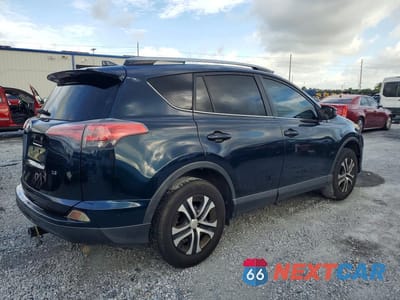 Trzecie zdjęcie samochodu z tyłu: 2018 TOYOTA RAV4 LE VIN:JTMZFREV5JJ168386 - miniatura
