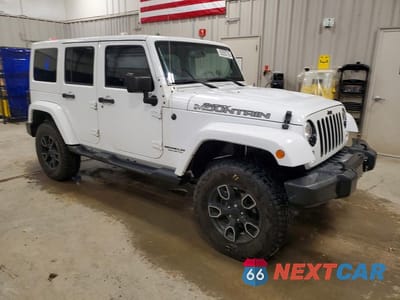 Czwarte zdjęcie samochodu z boku: 2017 JEEP WRANGLER UNLIMITED SAHARA VIN:1C4BJWEG5HL706292 - miniatura