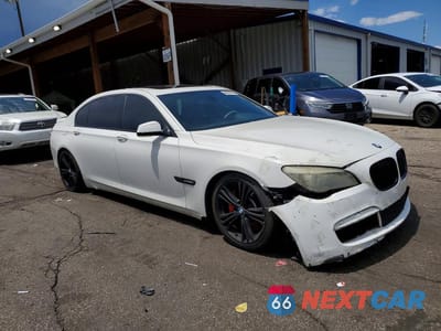 Czwarte zdjęcie samochodu z boku: 2012 BMW 750 LI VIN:WBAKB8C50CC962615 - miniatura