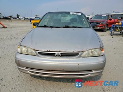 Piąte zdjęcie samochodu w środku: 1999 TOYOTA COROLLA VE VIN:1NXBR12E9XZ183393 - miniatura