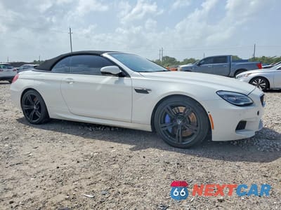 Czwarte zdjęcie samochodu z boku: 2016 BMW M6 VIN:WBS6G9C57GD931995 - miniatura