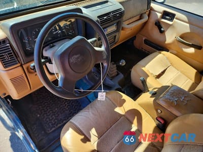 Zdjęcie 8 z 12 samochodu: 1997 JEEP WRANGLER / TJ SE VIN:1J4FY29PXVP511559 - miniatura