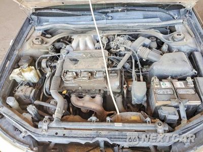 Zdjęcie 11 z 12 samochodu: 2003 TOYOTA CAMRY SOLARA SLE V6 VIN:2T1CF28P13C603915 - miniatura