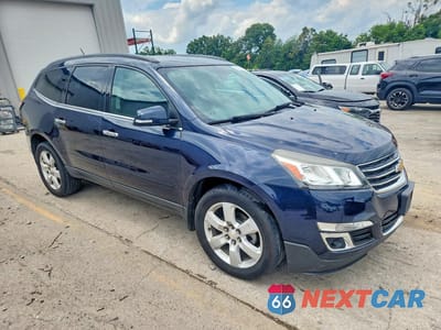 Czwarte zdjęcie samochodu z boku: 2017 CHEVROLET TRAVERSE LT VIN:1GNKRGKD1HJ287885 - miniatura