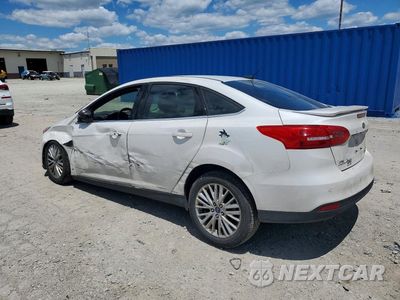 Drugie zdjęcie samochodu z przodu: 2015 FORD FOCUS TITANIUM VIN:1FADP3J24FL228725 - miniatura