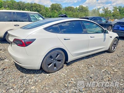 Trzecie zdjęcie samochodu z tyłu: 2021 TESLA MODEL 3 VIN:5YJ3E1EA6MF076156 - miniatura