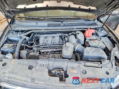 Zdjęcie 11 z 12 samochodu: 2016 FORD TAURUS SEL VIN:1FAHP2E85GG131800 - miniatura