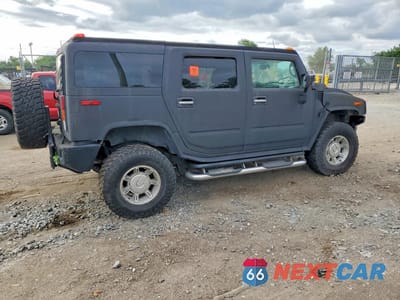Trzecie zdjęcie samochodu z tyłu: 2003 HUMMER H2 VIN:5GRGN23U53H138681 - miniatura