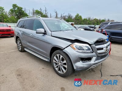 Czwarte zdjęcie samochodu z boku: 2016 MERCEDES-BENZ GL 450 4MATIC VIN:4JGDF6EE9GA648315 - miniatura