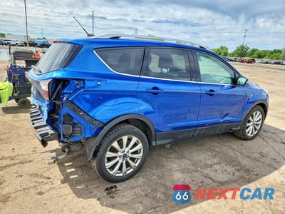 Trzecie zdjęcie samochodu z tyłu: 2017 FORD ESCAPE TITANIUM VIN:1FMCU0JD3HUE05630 - miniatura